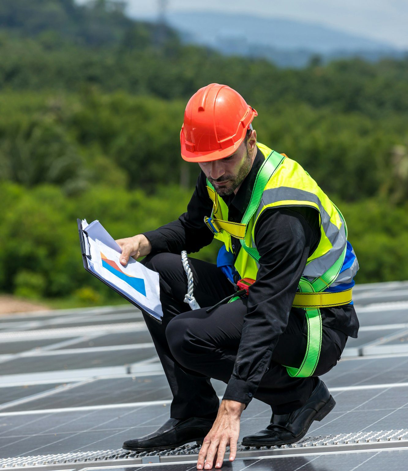 Engineer working setup Solar panel at the roof top. Engineer or worker work on solar panels or solar